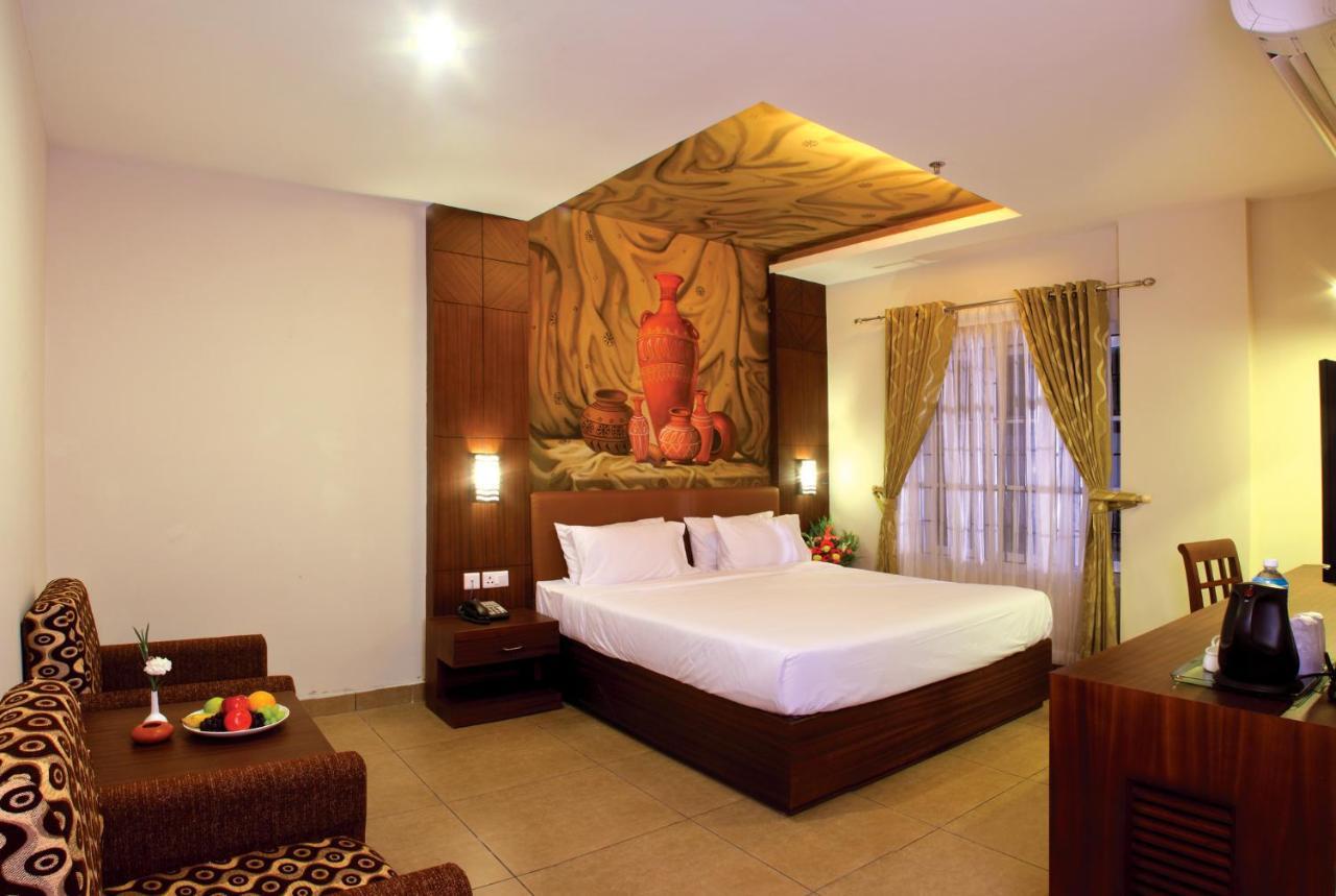 Clay House Hotel Thrissur Bagian luar foto