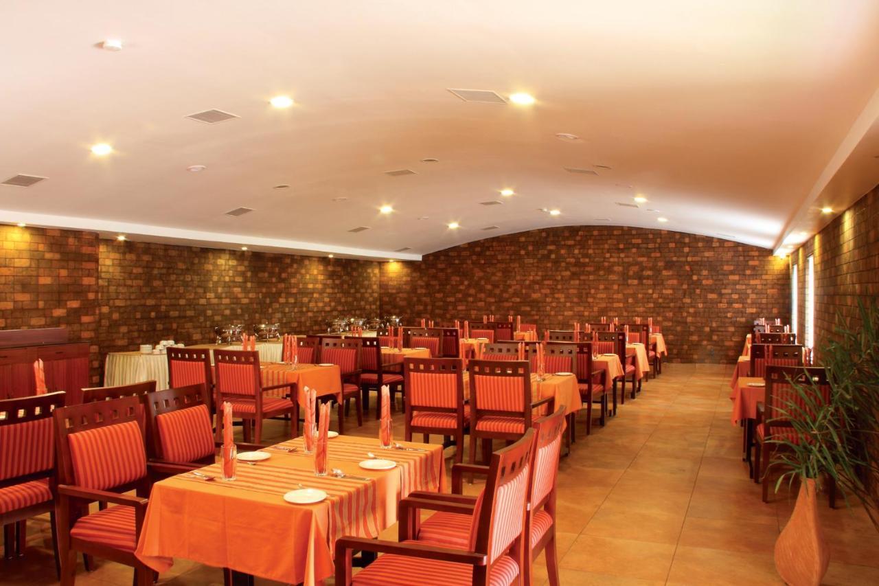Clay House Hotel Thrissur Bagian luar foto