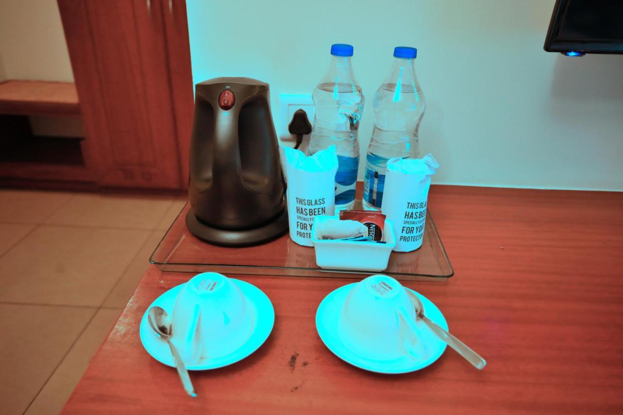 Clay House Hotel Thrissur Bagian luar foto